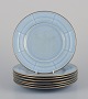 Arthur Percy for Gefle, Sweden. Seven Art Deco "Grand" plates in pastel blue 
porcelain with hand-painted gold trim.