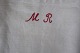 An old bag made of antique flax, with embroidery 
made by hand with a red signature "MR" 
This bag is a beautiful way to have your  laundry
65cm x 37cm
In a very good condition