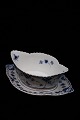 Royal Copenhagen Blue Fluted full lace sauce dish on fixed saucer. 
RC# 1/1105...