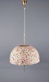 Hans-Agne Jakobsson for A/B Markaryd.
Ceiling lamp in brass, shade in floral-patterned fabric.