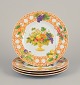 Christian Dior, Paris. Four Tutti Fiori, Tutti Frutti porcelain plates.