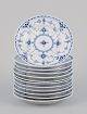 Royal Copenhagen Blue Fluted Half Lace, a set of twelve plates.