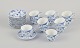 Royal Copenhagen Blue Fluted Half Lace, a set of twelve pairs of demitasse cups.