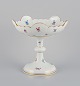 L'Art presents: 
Meissen, 
Germany. Large 
porcelain 
centerpiece. 
Polychrome 
floral motifs.