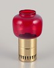 L'Art presents: 
Hans-Agne 
Jakobsson for 
A/B Markaryd.
Candlestick 
holder in brass 
and red art 
glass.