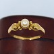 Georg Jensen; Ring of 18k gold, set with a pearl No. 180