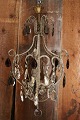 Old French prism chandelier with clear and violet glass prisms, as well as a lot 
of small glass beads...
