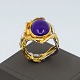 Antik 
Damgaard-
Lauritsen 
presents: 
Carl 
Antonsen; Ring 
in 14k gold and 
white gold with 
lapis lazuli