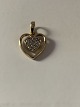 Pendant 14 carat gold, shaped like a Heart with clear stones