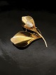 14 karat guld 
broche med 
perlemor