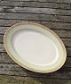 Dagmar med guld 
porcelæn, 
store, ovale 
fade 40cm