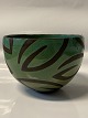 Ceramic glazed bowl, in green and brown colours.