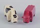 Kay Bojesen.Two early wooden figures in the shape of cows.