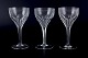 L'Art presents: 
Glimma, 
Sweden. Three 
red wine 
glasses in 
crystal, 
faceted bowl 
and stem.