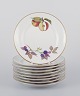 L'Art 
præsenterer: 
Royal 
Worcester, 
England. 
Et sæt på ni 
Evesham 
porcelænstallerkener 
dekoreret med 
frugter ...