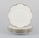 L'Art 
præsenterer: 
Et sæt på 
fem "Haviland" 
middagstallerkener 
af porcelæn.