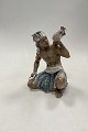 Danam Antik 
præsenterer: 
Dahl 
Jensen Figur af 
Sudanesisk mand 
med kakadue No. 
1305