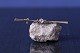 Smuk guldbroche 
i 14 karat 
guld, med stor 
klar sten. ...