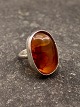 Sterling silver 
ring with amber