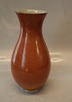 Klosterkælderen 
præsenterer: 
212-3473 
Kgl. Orange 
vase med gråt 
og guld 25 cm 
Kongelig Dansk 
Craquelé, 
Craquele