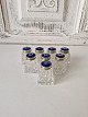 Set of 8 crystal salt shakers with lids in gilded silver and enamel
