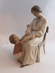 Bing & 
Grøndahl. 
Porcelænsfigur. 
Mor og barn. 
Model ...
