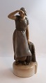 Bing & 
Grøndahl. 
Porcelænsfigur. 
Kvinde med 
fiskenet. ...