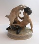 Royal 
Copenhagen. 
Porcelænsfigur. 
Faun med ged. 
Model ...