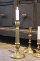 K&Co. presents: 
Old brass 
candlestick 
from the late 
19th century 
with a fine 
patina...