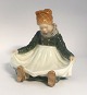 Royal 
Copenhagen. 
Siddende Fanø 
pige. Model 
1315. Højde ...