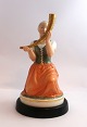 Royal 
Copenhagen. 
Pigen med 
guldhornet. 
Model 12242. 
...