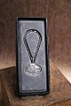 Georg Jensen 
jubilæums 
vedhæng med 
kæde i 
sterlingsølv...
