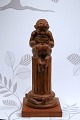 Decorative, old 
Pan figure 
sitting on a 
pillar carved 
in ...