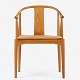 Hans J. Wegner / Fritz Hansen.
FH 4283 - Chinese chair in cherry with cushion in patinated natural leather. 
Manufacturer