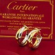 Antik Damgaard-Lauritsen præsenterer: Cartier; Par medium Trinity øreringe af 18 kt. guld
