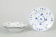 L'Art præsenterer: Royal Copenhagen Musselmalet Riflet, sæt af fire pastatallerkener.