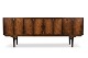 Lundin Antique præsenterer: Fantastisk lav palisander skænk. 227cm. god stand. stemplet made in Denmark. ...