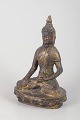 L'Art præsenterer: Buddhafigur i forgyldt bronze.
