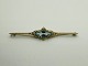 14 karats guld broche