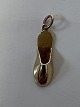Antik Huset præsenterer: Hjemmesko Vedhæng/Charms i 14 karat guld.Højde: 2,2 cm.