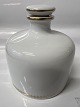 Irma Snaps / Bitter Flaske i Porcelæn fra Bing & Grøndahl.H 11,5 X Ø 10,5 cm.