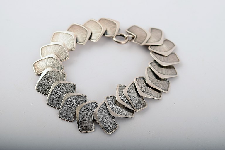 Modern Scandinavian design bracelet in silver.