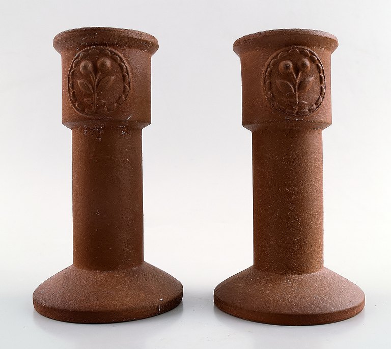 Gustavsberg. A pair of unglazed candlesticks in stoneware.