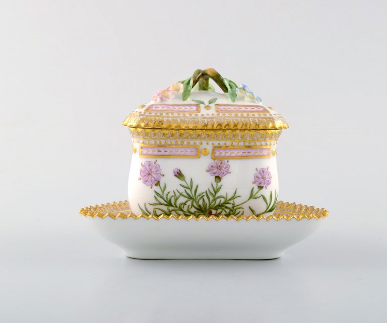 Royal Copenhagen Flora Danica triangular cream cup. Dessin # 20/3575 with branch 
shaped handle and flowers.
