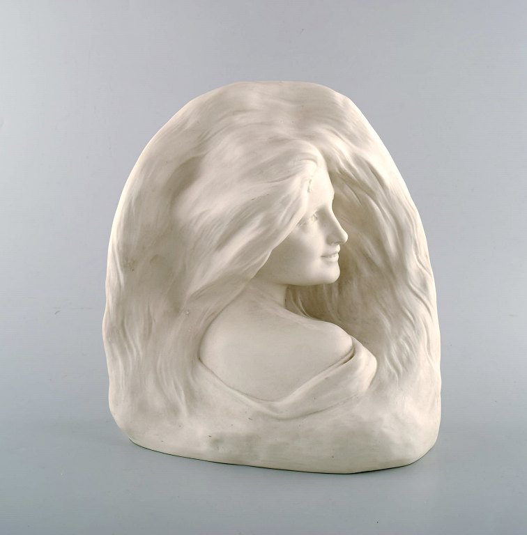 Herman Neujd for Gustafsberg / Gustavsberg bust of smiling young woman. Art 
nouveau sculpture in biscuit dated 1906.