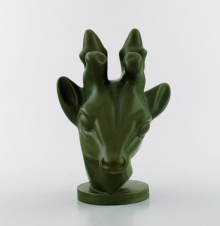 Axel Salto for the Ipsens widow. Art deco deer head in dark green glaze.