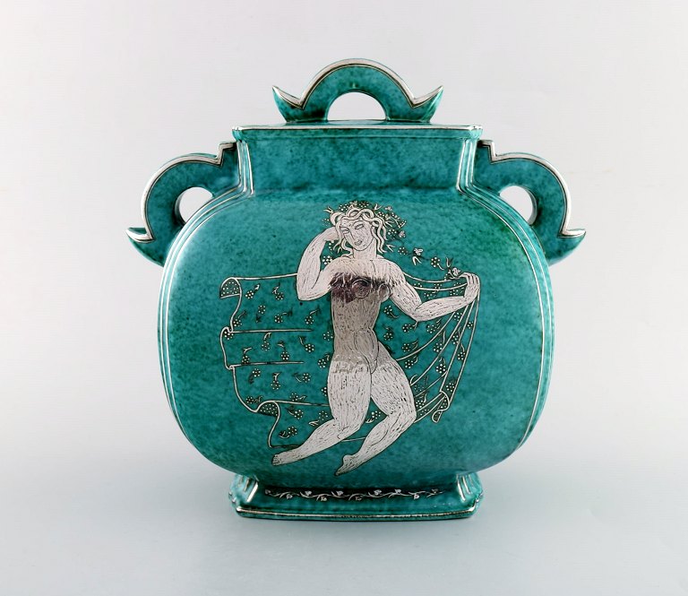 Wilhelm Kåge for Gustavsberg. Large Argenta art deco ceramic lidded jar 
decorated with silver inlaid. Sweden 1940