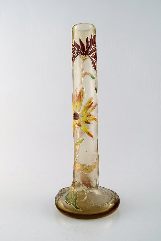 Early Emile Gallé Japaneseism vase in clear frosted glass. Carved with motifs in 
the form of flowers and leaves in yellow and red art glass. 1890