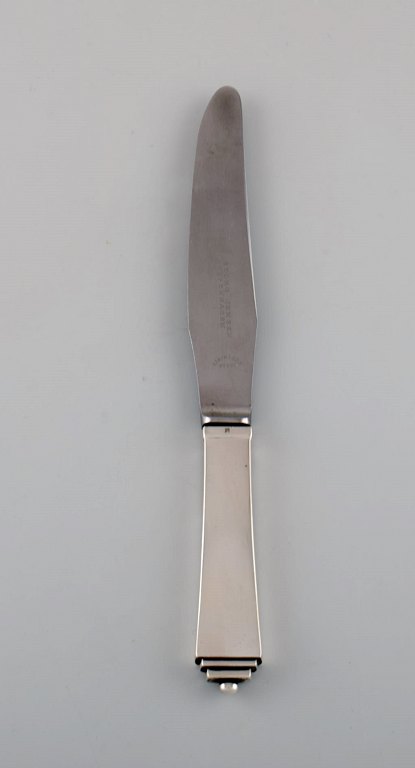 Georg Jensen Pyramid dinner knife in sterling silver and stainless steel. Dated 
1933-44.
