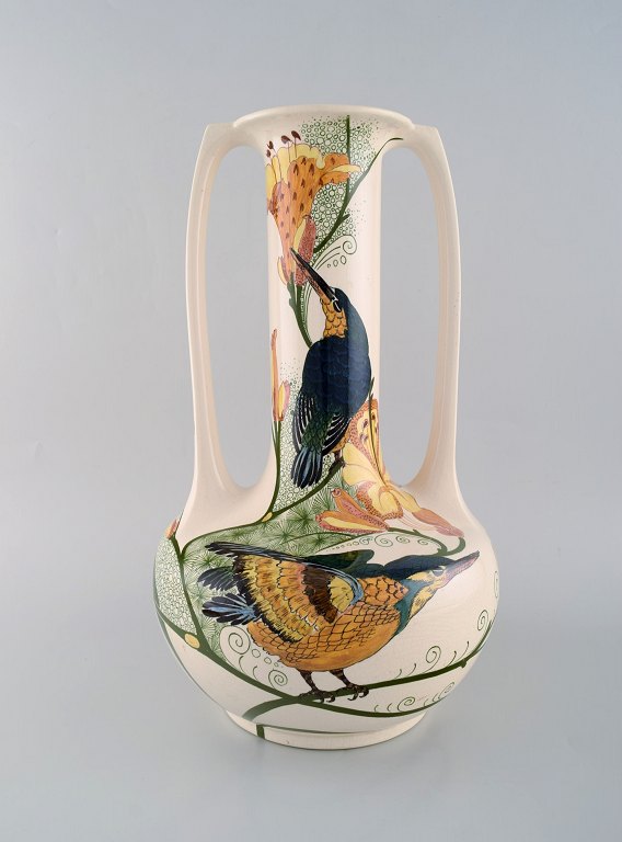 Amphora, Holland. Large art nouveau vase with handles in hand-painted faience 
with bird motifs. Early 20th century.
